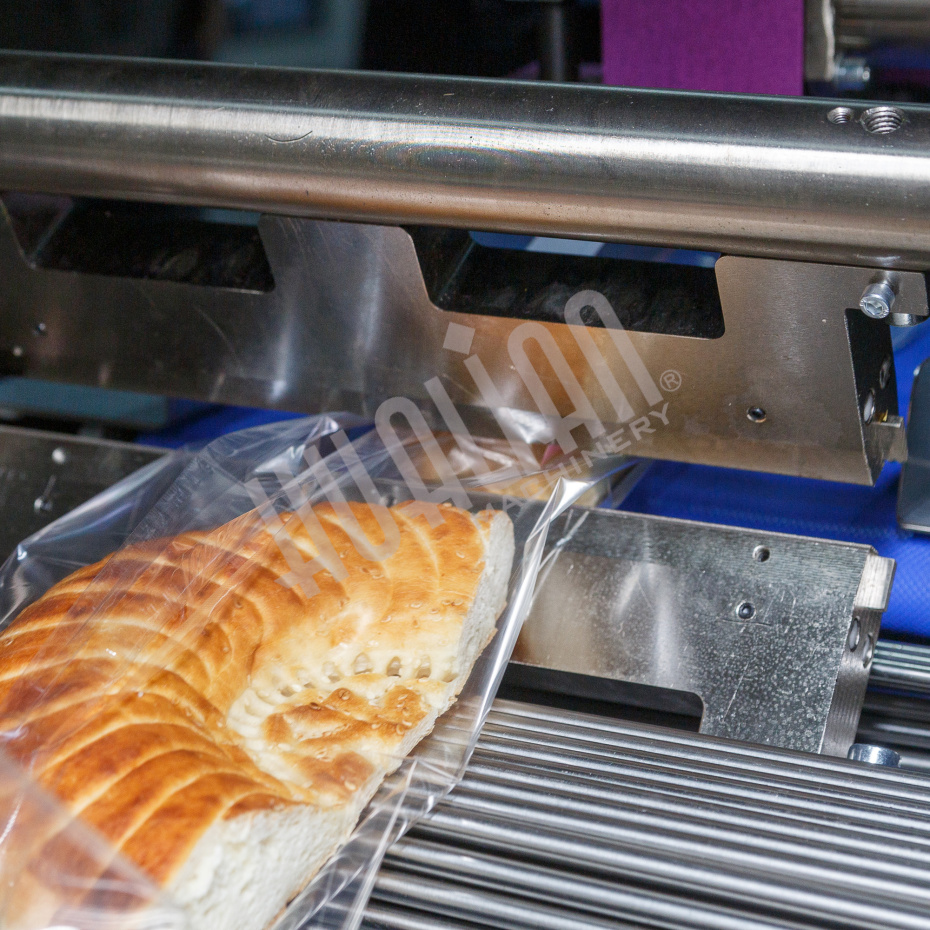 Горизонтальная упаковочная машина DXDZ-600XD (3 серв., H-110 мм, L не огр., W 145-285 мм, HL-1108, круг. отв., подбой, прок. пакета) Hualian - Купить с доставкой по всей Беларуси