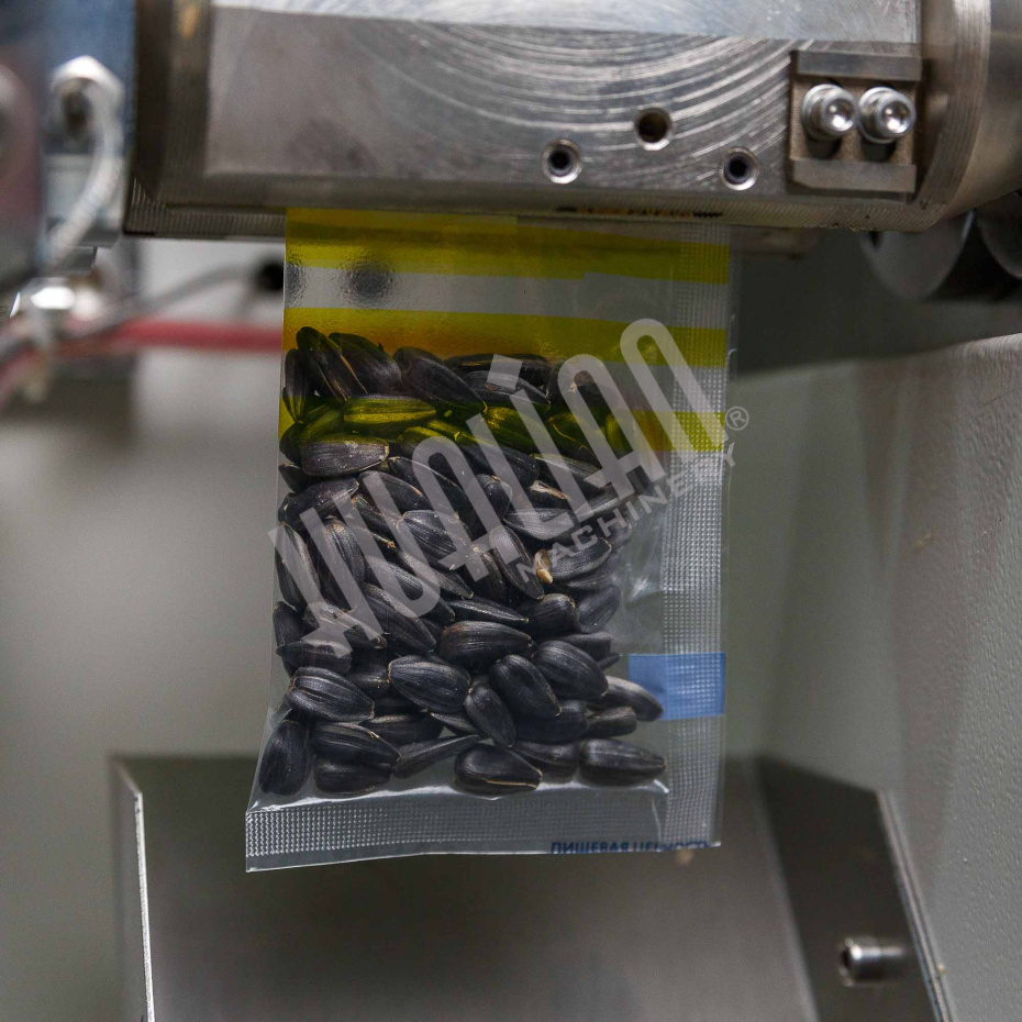 Автомат для упаковки сыпучих продуктов DXDK-40ll Hualian - Купить с доставкой по всей Беларуси