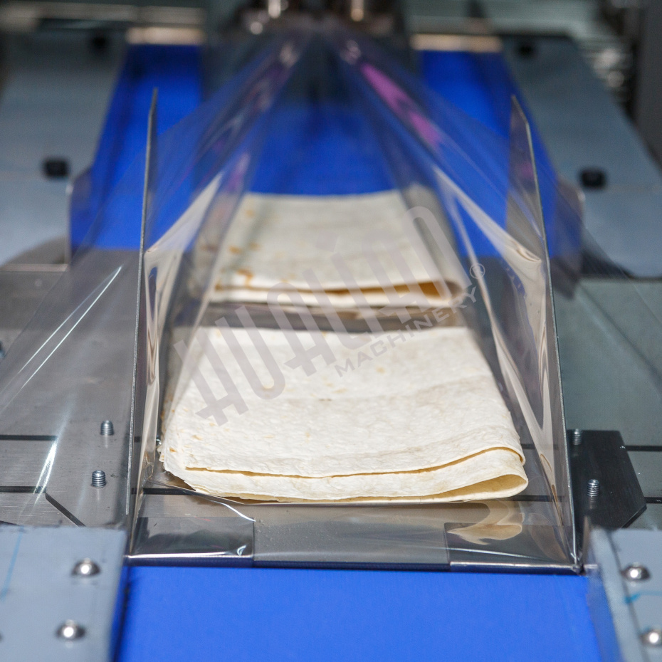 Горизонтальная упаковочная машина DXDZ-600XD (3 серв., H-110 мм, L не огр., W 145-285 мм, HL-1108, круг. отв., подбой, прок. пакета) Hualian - Купить с доставкой по всей Беларуси