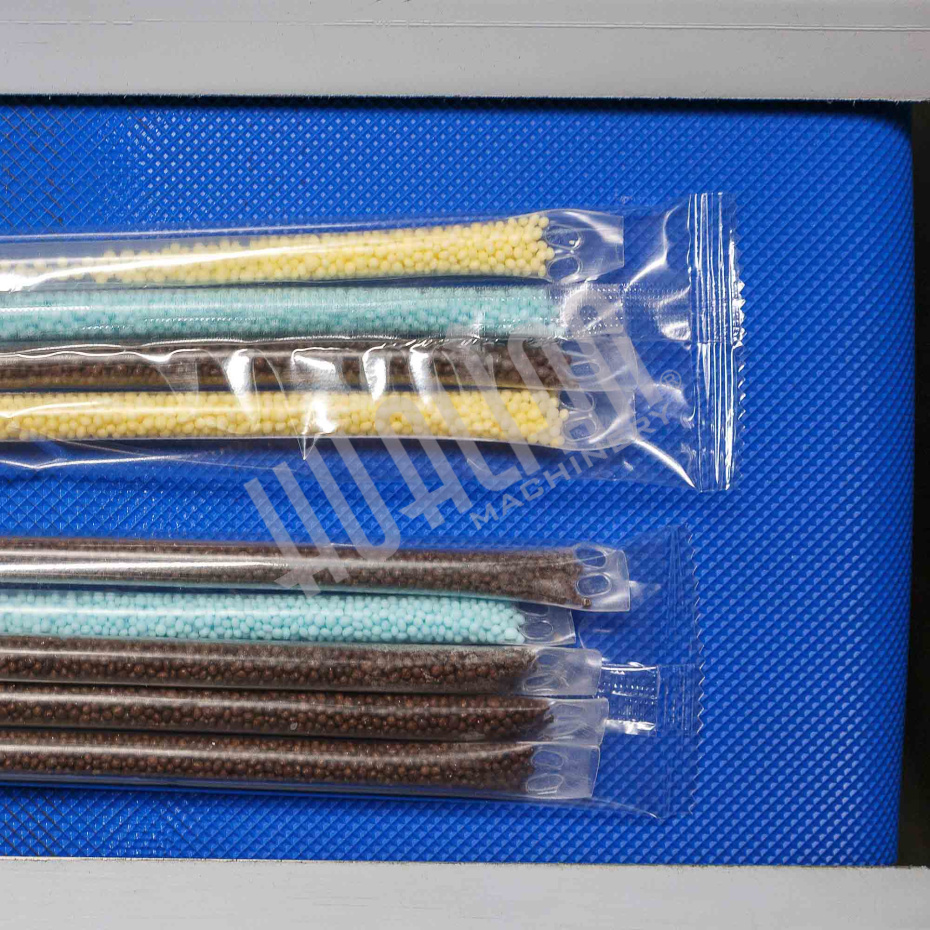 Горизонтальная упаковочная машина DXDZ-250XD  (H-40мм, bag L 65-190mm, S 200mm, регулируемый формирователь, вставки в транспортере) Hualian - Купить с доставкой по всей Беларуси