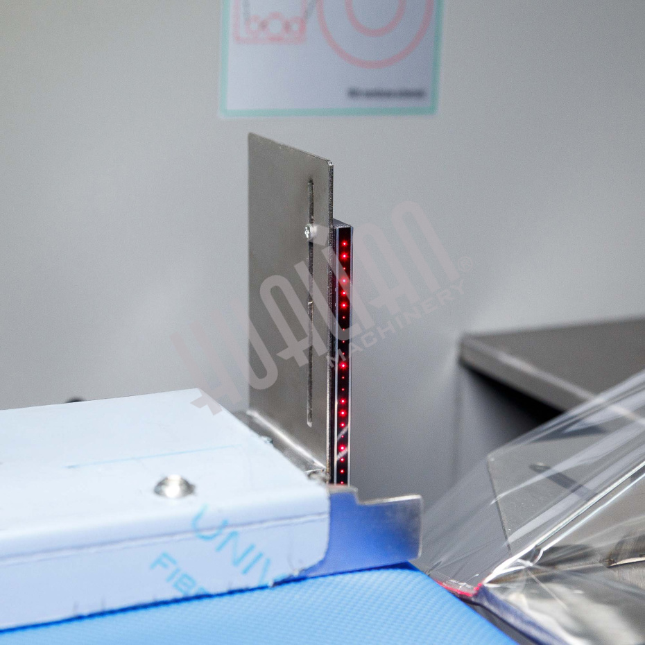 Горизонтальная упаковочная машина DXDZ-600XD (лент. 250 мм, рег.форм., S 400, L 180-500, H-120, трансп.попереч.запайки) Hualian - Купить с доставкой по всей Беларуси