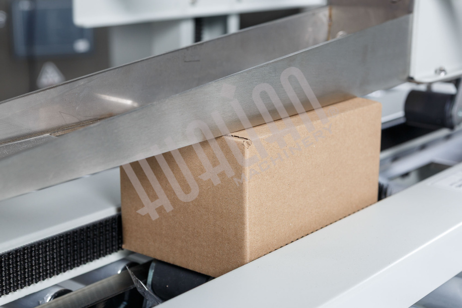 Полуавтоматический заклейщик коробов FXJ-2550X Hualian - Купить с доставкой по всей Беларуси