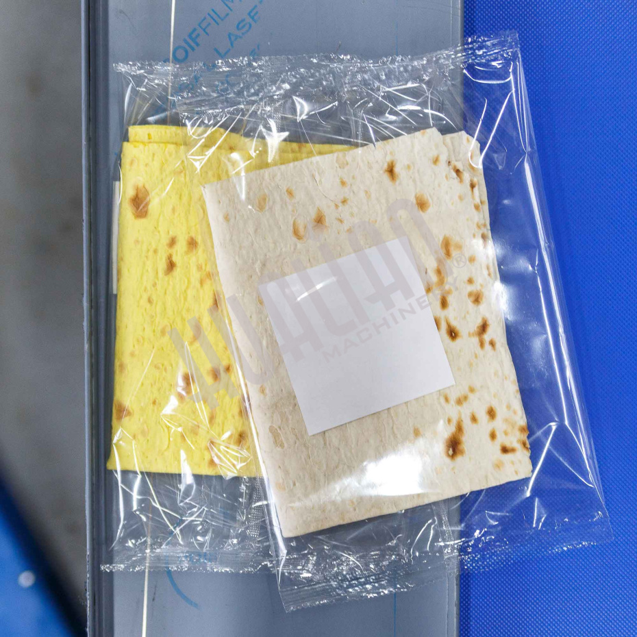 Горизонтальная упаковочная машина DXDZ-600XD (лент. 250 мм, рег.форм., S 400, L 180-500, H-120, трансп.попереч.запайки) Hualian - Купить с доставкой по всей Беларуси