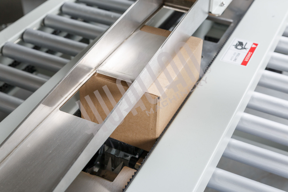 Полуавтоматический заклейщик коробов FXJ-2550X Hualian - Купить с доставкой по всей Беларуси