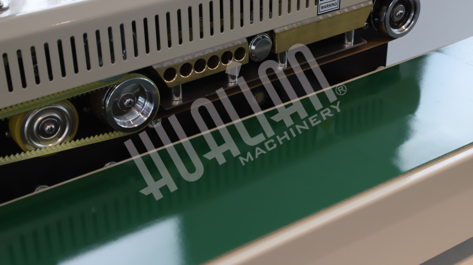 Роликовый конвейерный запайщик горизонтальный FRB-770I Hualian - Купить с доставкой по всей Беларуси