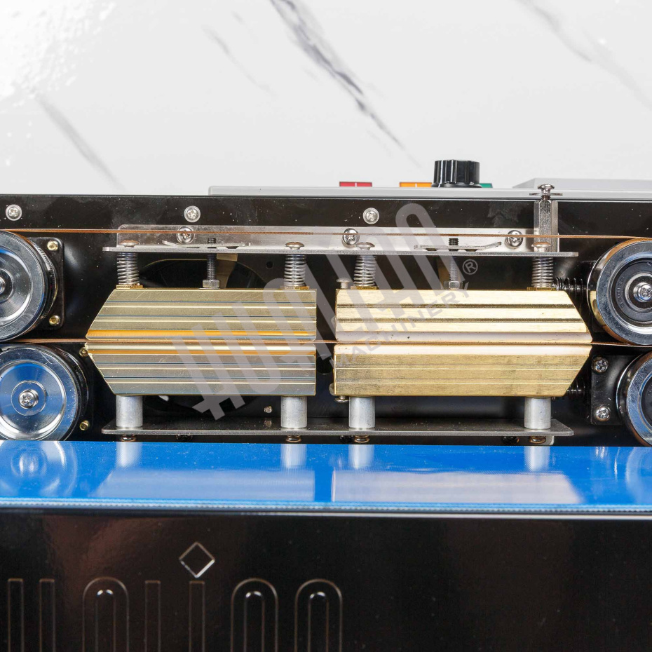 Роликовый (конвейерный) запайщик с правой подачей FRD-750E (горизонт.) Hualian - Купить с доставкой по всей Беларуси