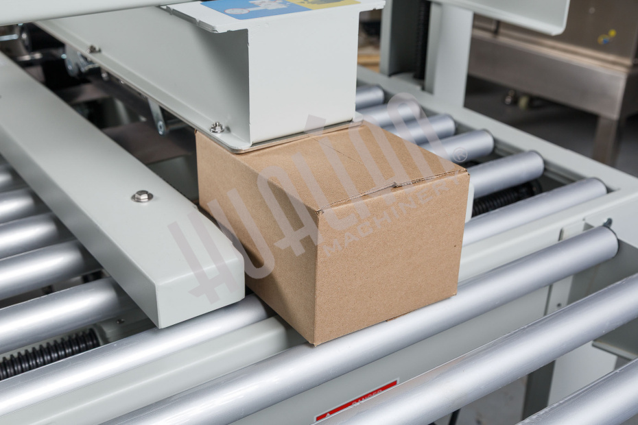 Полуавтоматический заклейщик коробов FXJ-2550X Hualian - Купить с доставкой по всей Беларуси