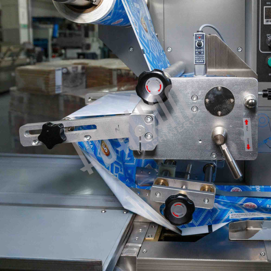 Автоматическая горизонтальная упаковочная машина DXDZ-250D NEW (1 нож, bag L 120-280mm, S 250mm, H - 40 mm) Hualian - Купить с доставкой по всей Беларуси