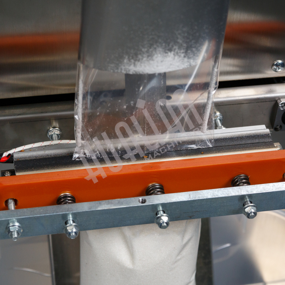 Автоматическая фасовочно-упаковочная машина DXDK-1000 NEW (пакет-подушка,W пленки 420 мм,фотодатчик) Hualian - Купить с доставкой по всей Беларуси