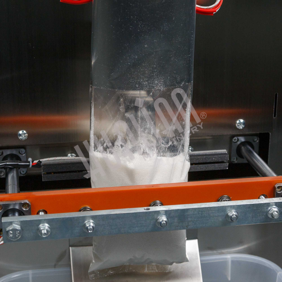 Автоматическая фасовочно-упаковочная машина DXDK-1000 NEW (пакет подушка, ширина пленки 300 мм, фотодатчик) Hualian - Купить с доставкой по всей Беларуси