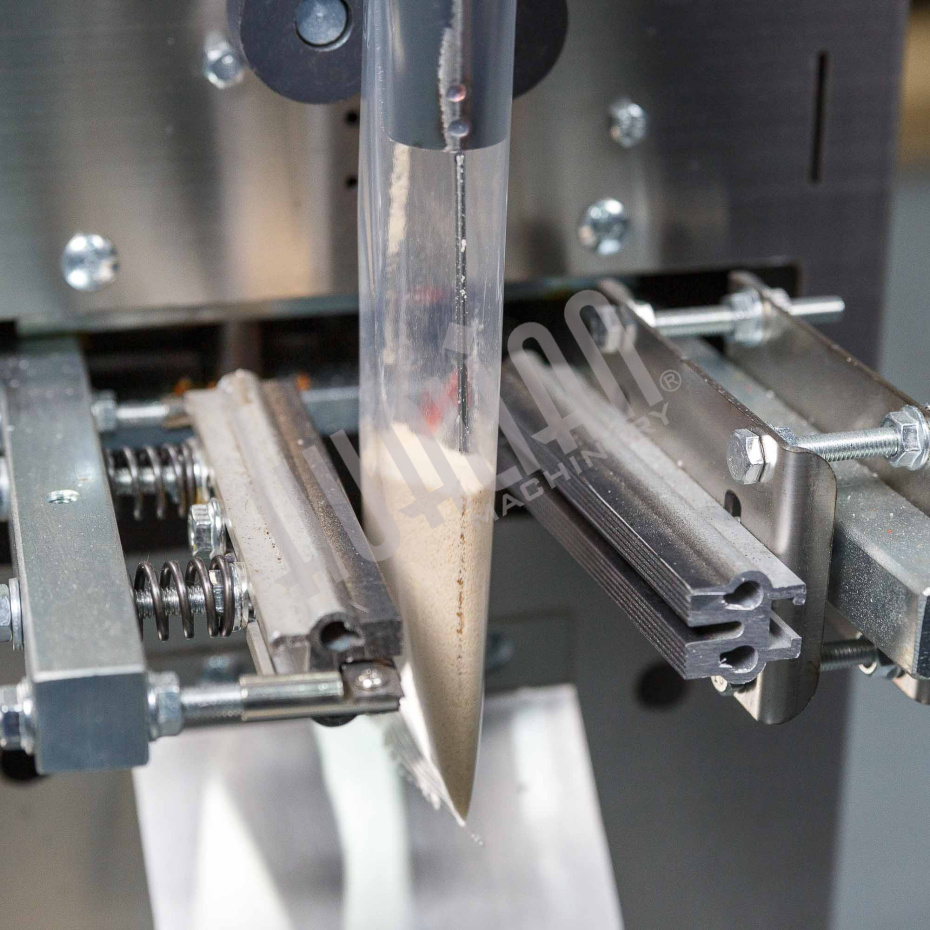 Автоматическая фасовочно-упаковочная машина DXDK-100 NEW (3-х шовный пакет, ширина пленки 150 мм) Hualian - Купить с доставкой по всей Беларуси