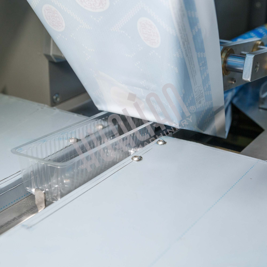 Автоматическая горизонтальная упаковочная машина DXDZ-250D NEW (1 нож, bag L 120-280mm, S 250mm, H - 40 mm) Hualian - Купить с доставкой по всей Беларуси