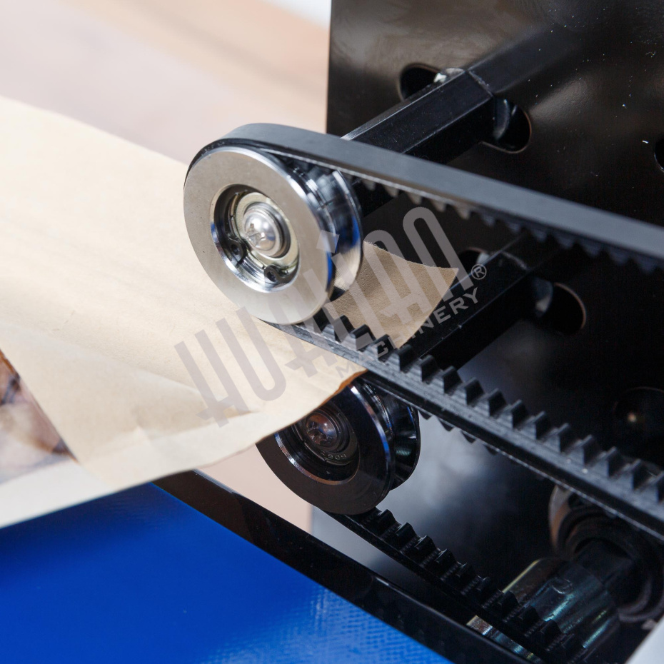 Роликовый (конвейерный) запайщик с правой подачей FRD-750E (горизонт.) Hualian - Купить с доставкой по всей Беларуси