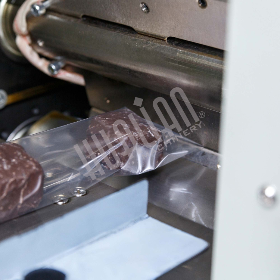 Автоматическая горизонтальная упаковочная машина DXDZ-250B (3 servo, рег. форм., min bag L 65, S 200, H 40, 2-х позиц. нож) Hualian - Купить с доставкой по всей Беларуси