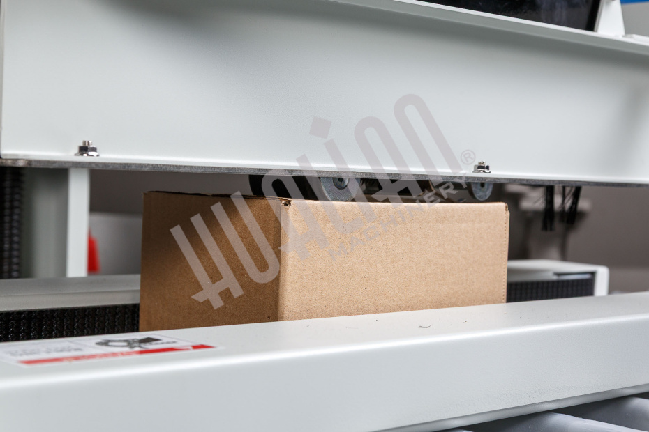 Полуавтоматический заклейщик коробов FXJ-2550X Hualian - Купить с доставкой по всей Беларуси