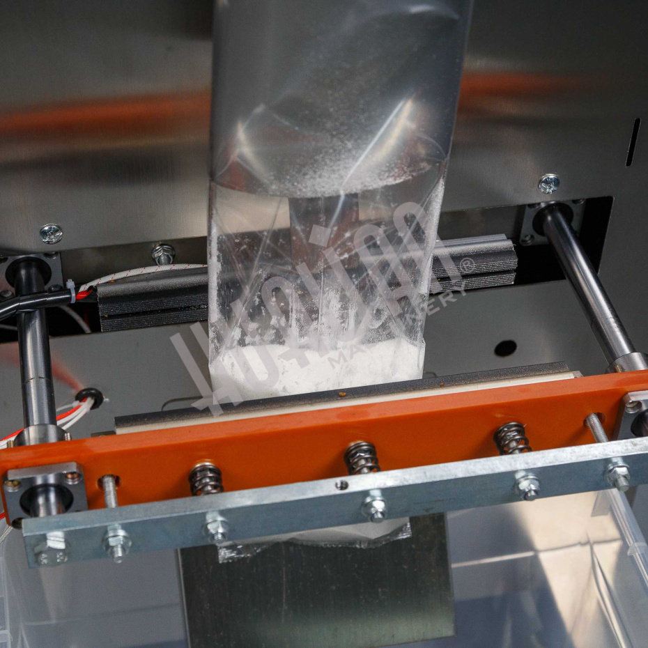 Автоматическая фасовочно-упаковочная машина DXDK-1000 NEW (пакет подушка, ширина пленки 300 мм, фотодатчик) Hualian - Купить с доставкой по всей Беларуси