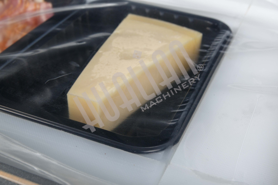 Скин-упаковочная машина HLV-300VST NEW на два лотка (глубина лотка 55 мм) Hualian - Купить с доставкой по всей Беларуси