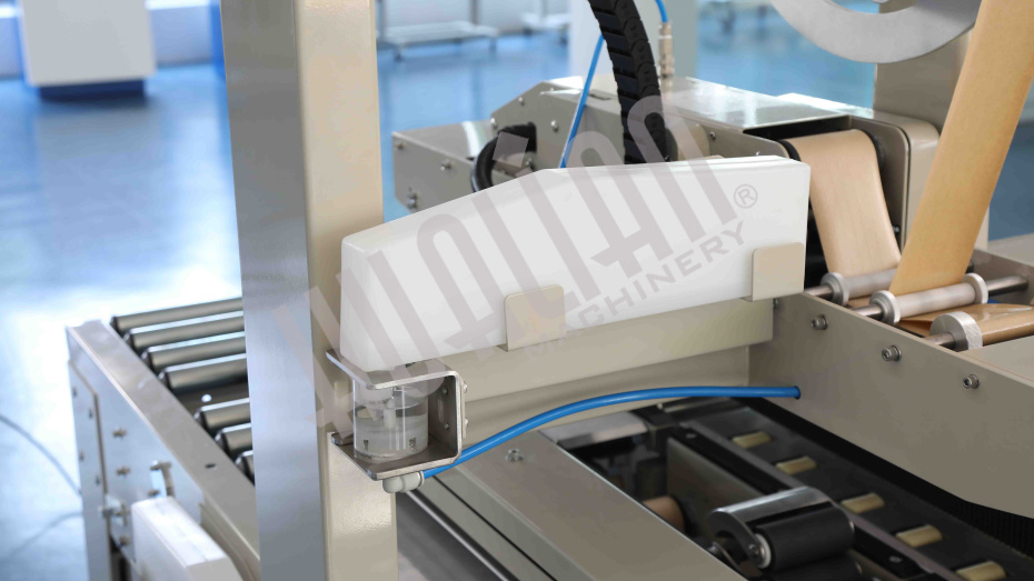 Автоматический заклейщик коробов с активируемой водой лентой FXW-6050 Hualian - Купить с доставкой по всей Беларуси