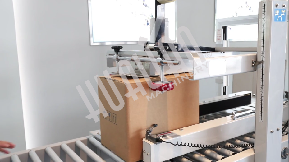 Полуавтоматический заклейщик коробов FXJ-5050L Hualian - Купить с доставкой по всей Беларуси