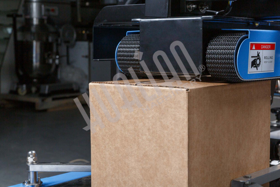 Полуавтоматический заклейщик коробов FXJ-6050С Hualian - Купить с доставкой по всей Беларуси