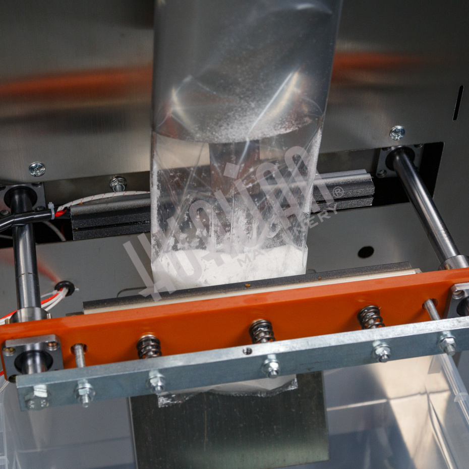 Автоматическая фасовочно-упаковочная машина DXDK-1000 NEW (пакет-подушка,W пленки 420 мм,фотодатчик) Hualian - Купить с доставкой по всей Беларуси