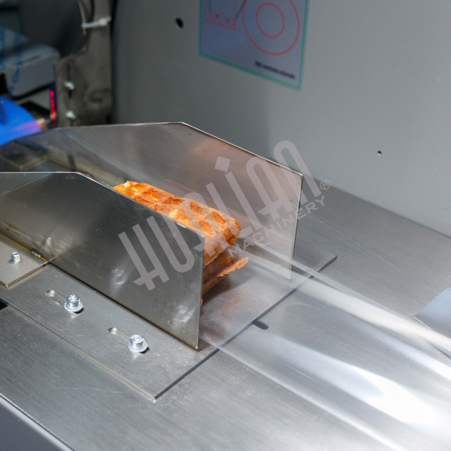 Горизонтальная упаковочная машина DXDZ-250XD (лент. 60 мм, рег. форм., S 250, L 120-280, H 60) Hualian - Купить с доставкой по всей Беларуси