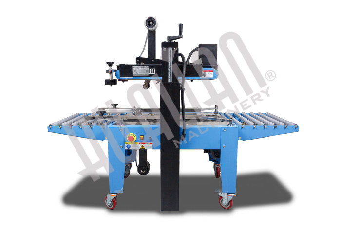 Полуавтоматический заклейщик коробов FXJ-6050С Hualian - Купить с доставкой по всей Беларуси