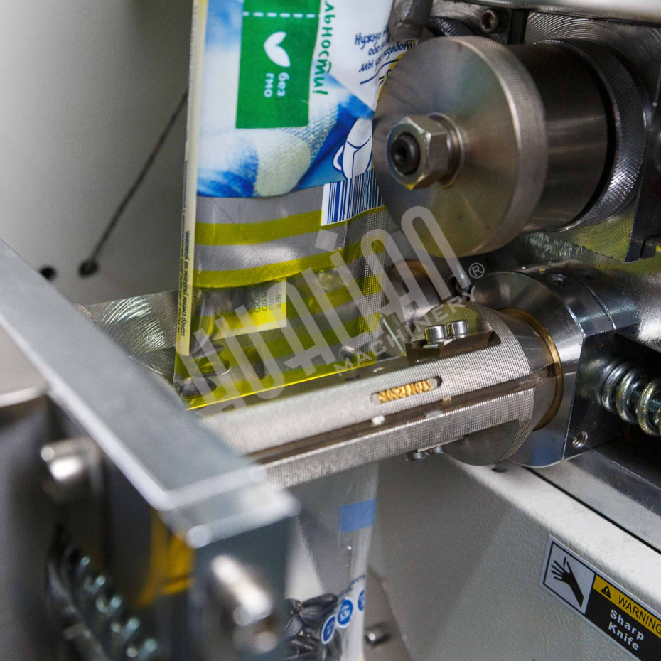 Автомат для упаковки сыпучих продуктов DXDK-40ll Hualian - Купить с доставкой по всей Беларуси