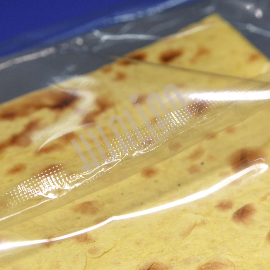 Горизонтальная упаковочная машина DXDZ-600XD (лент. 250 мм, рег.форм., S 400, L 180-500, H-120, трансп.попереч.запайки) Hualian - Купить с доставкой по всей Беларуси