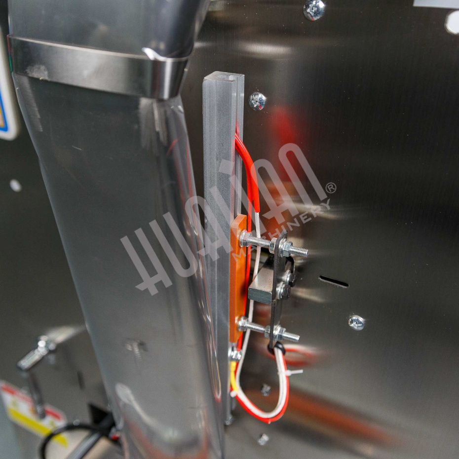 Автоматическая фасовочно-упаковочная машина DXDK-1000 NEW (пакет подушка, ширина пленки 300 мм, фотодатчик) Hualian - Купить с доставкой по всей Беларуси