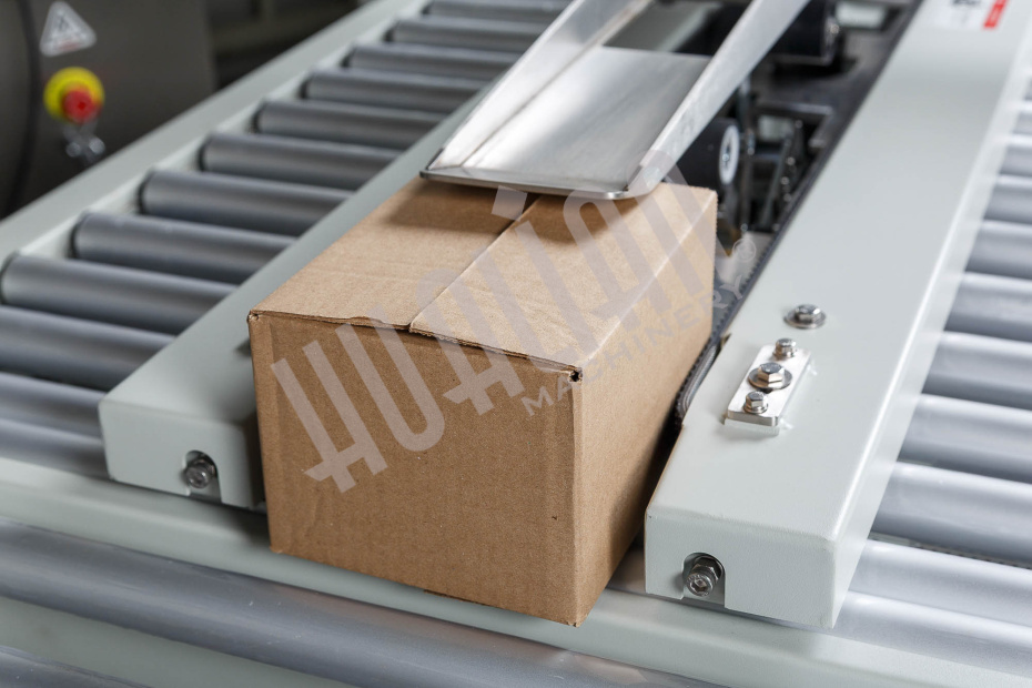 Полуавтоматический заклейщик коробов FXJ-2550X Hualian - Купить с доставкой по всей Беларуси