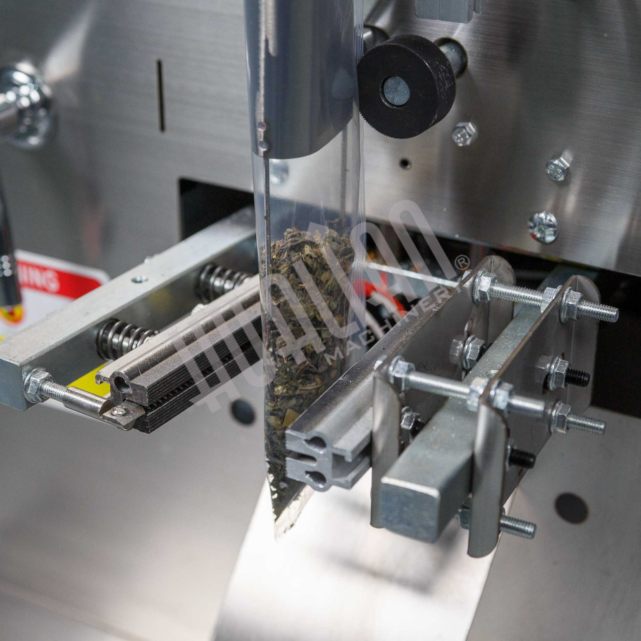 Автоматическая фасовочно-упаковочная машина DXDK-100 NEW (3-х шовный пакет, ширина пленки 150 мм) Hualian - Купить с доставкой по всей Беларуси